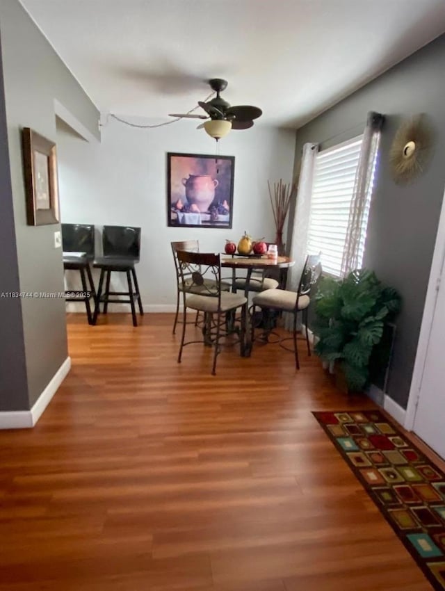 13255 SW 7th Ct Unit 213D, Pembroke Pines, FL 33027 - dining area with ceiling fan and wood finished floors