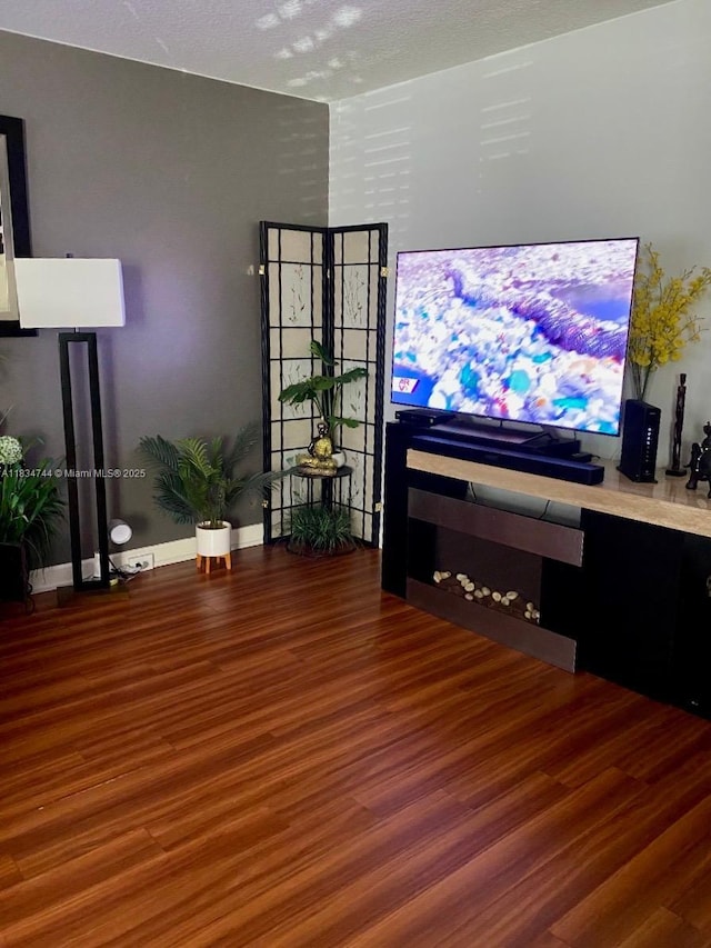 13255 SW 7th Ct Unit 213D, Pembroke Pines, FL 33027 - unfurnished living room with wood finished floors and baseboards