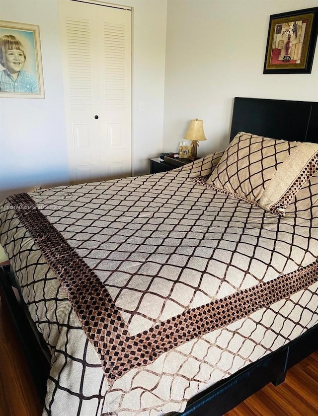 13255 SW 7th Ct Unit 213D, Pembroke Pines, FL 33027 - bedroom with a closet and wood finished floors