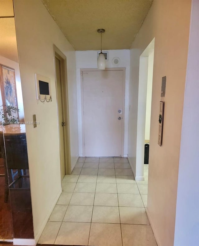 1470 NE 125th Ter Unit 814, North Miami, FL 33161 - hall with baseboards and light tile patterned floors