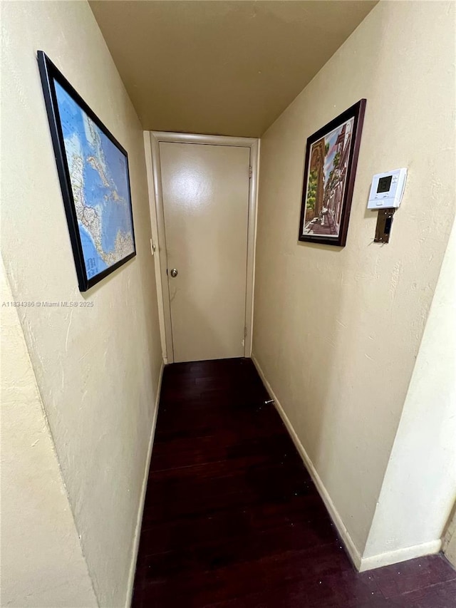 1470 NE 125th Ter Unit 814, North Miami, FL 33161 - hallway featuring wood finished floors