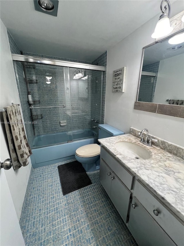 1470 NE 125th Ter Unit 814, North Miami, FL 33161 - bathroom featuring vanity, bath / shower combo with glass door, and tile patterned floors