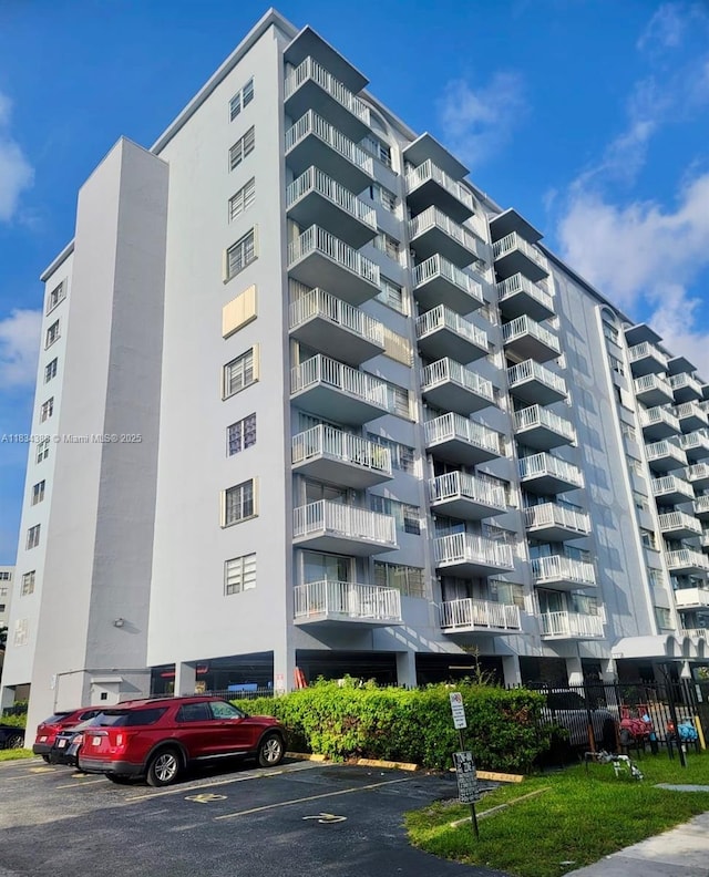 1470 NE 125th Ter Unit 814, North Miami, FL 33161 - view of apartment building / complex with uncovered parking