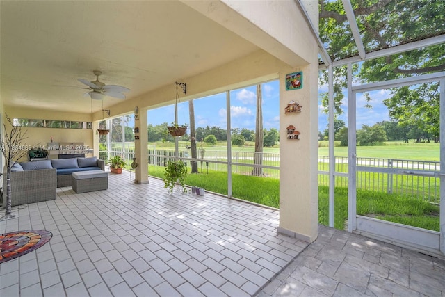 1211 E Wilshire Cir, Pembroke Pines, FL 33027 - sunroom with a ceiling fan, an outdoor living space, and view of scattered trees