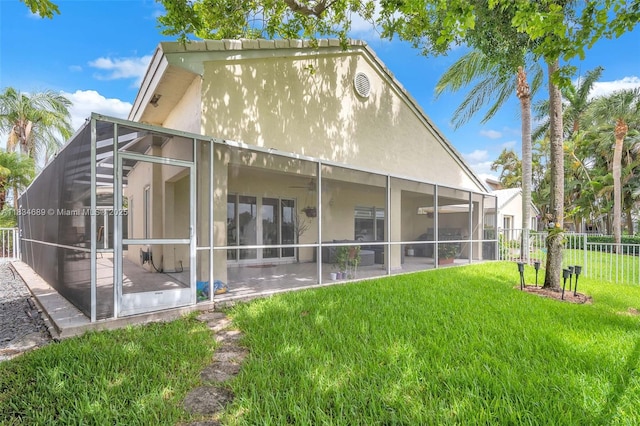1211 E Wilshire Cir, Pembroke Pines, FL 33027 - back of property with a ceiling fan and stucco siding