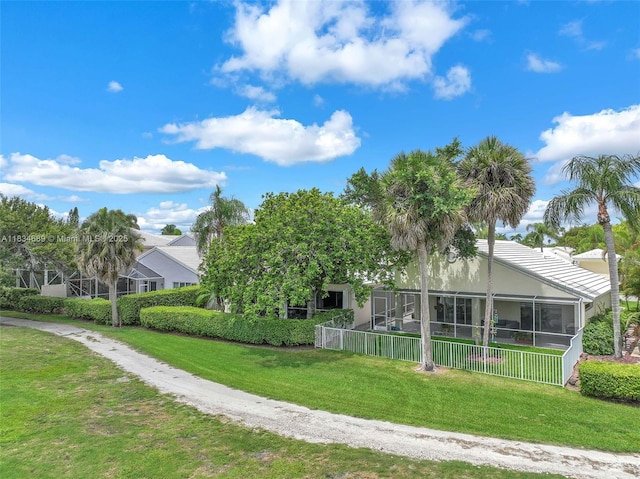 1211 E Wilshire Cir, Pembroke Pines, FL 33027 - back of house with a yard and stucco siding