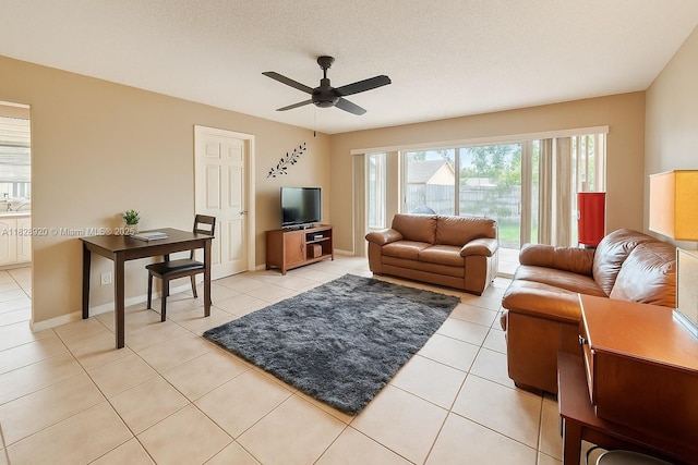 7523 W Sunrise Blvd Unit B2, Plantation, FL 33313 - living room with a ceiling fan and light tile patterned floors