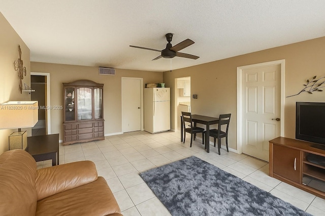 7523 W Sunrise Blvd Unit B2, Plantation, FL 33313 - living room featuring a ceiling fan and light tile patterned flooring