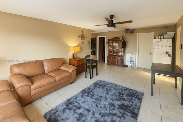 7523 W Sunrise Blvd Unit B2, Plantation, FL 33313 - living room with a ceiling fan and light tile patterned floors