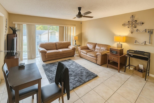 7523 W Sunrise Blvd Unit B2, Plantation, FL 33313 - living area featuring ceiling fan, a textured ceiling, and light tile patterned floors