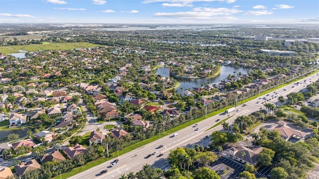 14501 SW 33rd Ct, Miramar, FL 33027 - aerial view of property and surrounding area featuring a nearby body of water and nearby suburban area