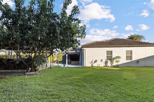 14501 SW 33rd Ct, Miramar, FL 33027 - back of house with a lawn and stucco siding