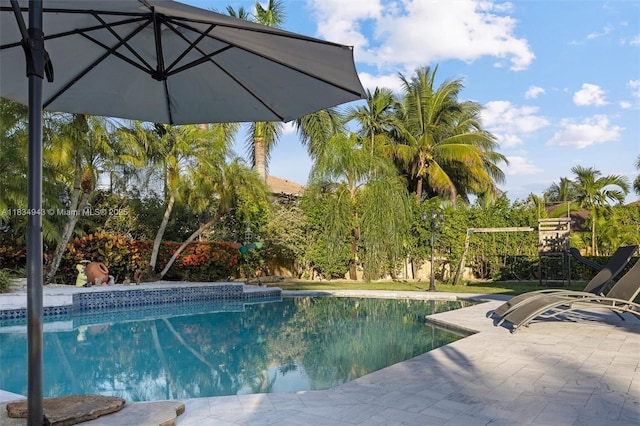 14501 SW 33rd Ct, Miramar, FL 33027 - outdoor pool with a patio area