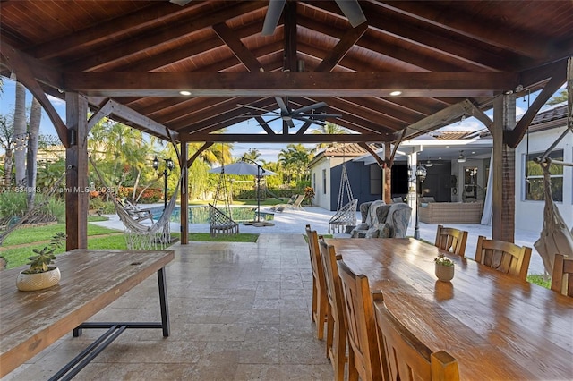 14501 SW 33rd Ct, Miramar, FL 33027 - view of patio / terrace featuring a gazebo, outdoor dining space, a pool, and a ceiling fan