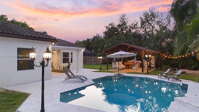 14501 SW 33rd Ct, Miramar, FL 33027 - swimming pool with a gazebo, a patio, and an outdoor living space