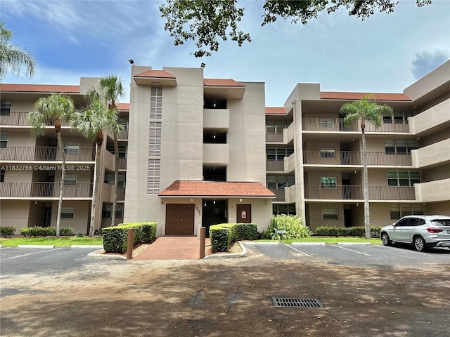 1831 Sabal Palm Dr Unit 404, Davie, FL 33324 - view of apartment building / complex with uncovered parking