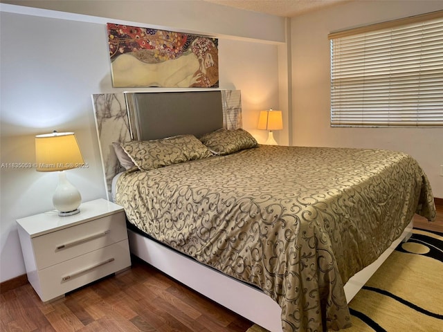 201 180th Dr Unit 114, Sunny Isles Beach, FL 33160 - bedroom featuring wood finished floors