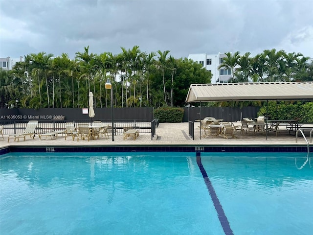 201 180th Dr Unit 114, Sunny Isles Beach, FL 33160 - community pool featuring a patio