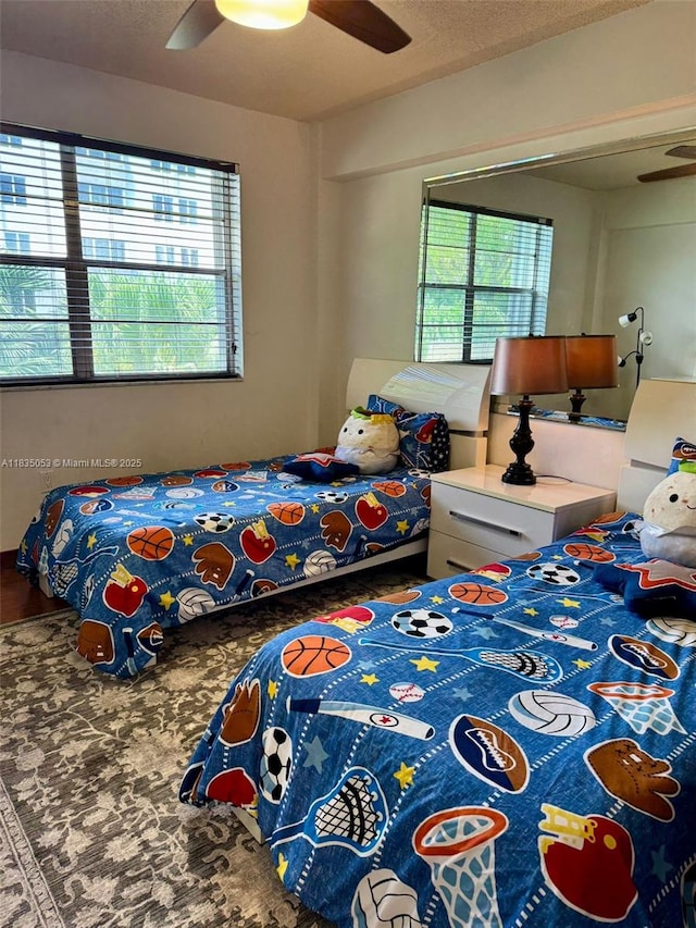 201 180th Dr Unit 114, Sunny Isles Beach, FL 33160 - bedroom featuring ceiling fan