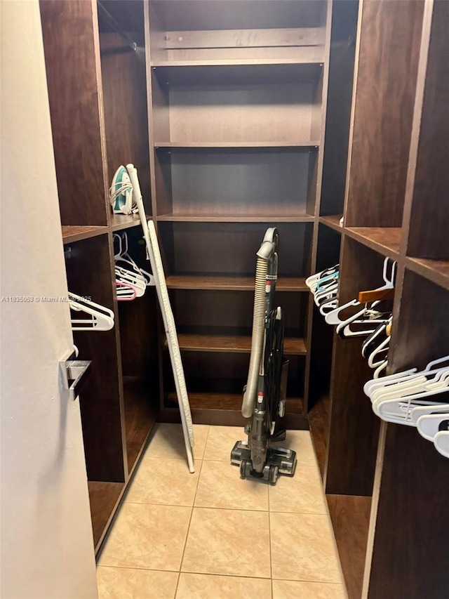 201 180th Dr Unit 114, Sunny Isles Beach, FL 33160 - spacious closet with tile patterned floors