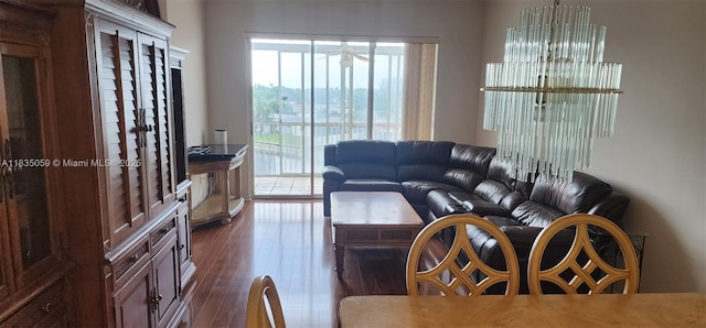 9575 Weldon Cir Unit C406, Tamarac, FL 33321 - living room featuring dark wood-type flooring and a ceiling fan