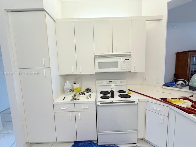 9575 Weldon Cir Unit C406, Tamarac, FL 33321 - kitchen with white appliances, light countertops, and light tile patterned floors