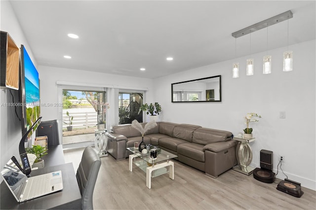 2418 NW 52nd St, Tamarac, FL 33309 - living room featuring light wood-style floors and recessed lighting