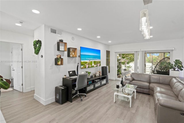 2418 NW 52nd St, Tamarac, FL 33309 - living room with an office area, light wood-style flooring, and recessed lighting