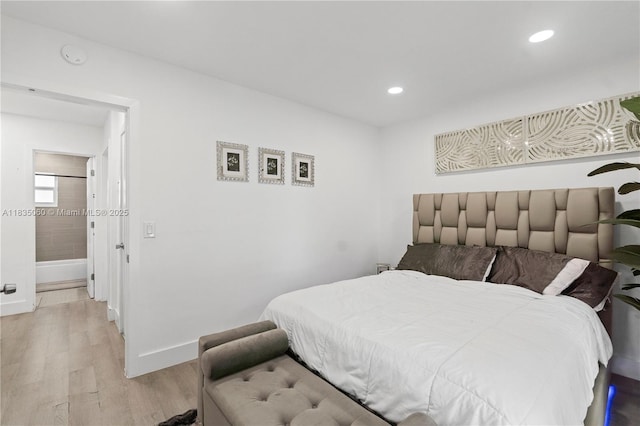 2418 NW 52nd St, Tamarac, FL 33309 - bedroom with light wood finished floors and recessed lighting