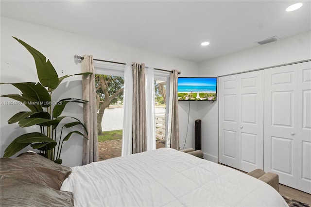 2418 NW 52nd St, Tamarac, FL 33309 - bedroom with access to outside, recessed lighting, wood finished floors, and a closet