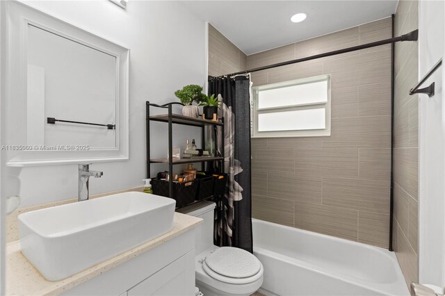 2418 NW 52nd St, Tamarac, FL 33309 - full bathroom with shower / bath combination with curtain and vanity
