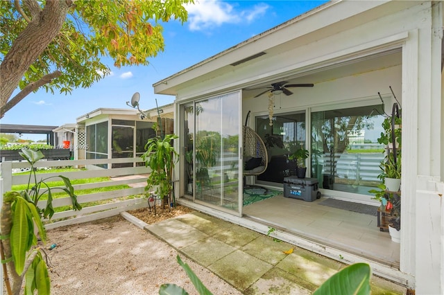 2418 NW 52nd St, Tamarac, FL 33309 - view of patio featuring a sunroom