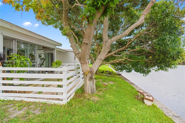 2418 NW 52nd St, Tamarac, FL 33309 - view of yard with a sunroom and a water view