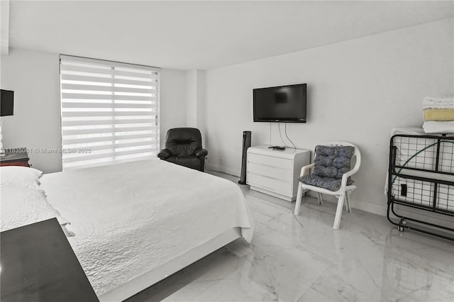 8877 Collins Ave Unit 705, Surfside, FL 33154 - bedroom featuring marble finish floors and baseboards