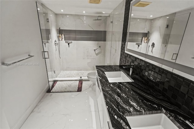 8877 Collins Ave Unit 705, Surfside, FL 33154 - full bath with marble tiled flooring, a marble finish shower, vanity, and recessed lighting