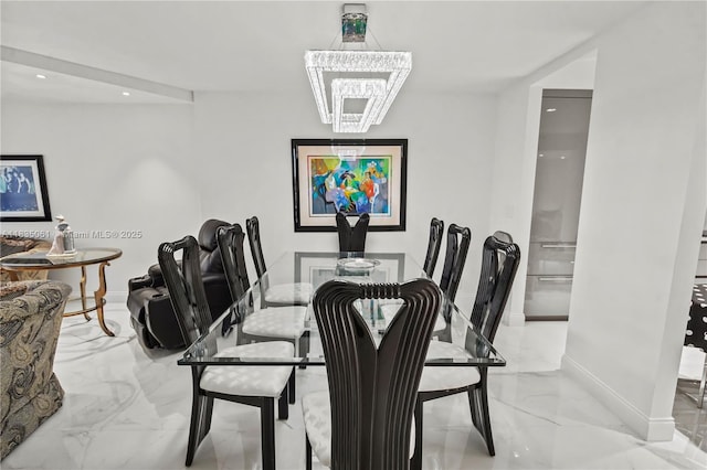 8877 Collins Ave Unit 705, Surfside, FL 33154 - dining room featuring light marble finish floors and recessed lighting