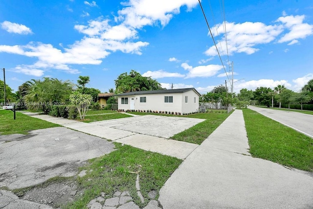 5201 Wiley St, Hollywood, FL 33021 - view of front of home with a front yard