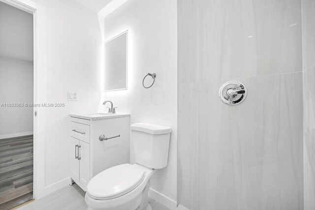 5201 Wiley St, Hollywood, FL 33021 - full bath with vanity, a shower, and wood finished floors