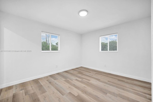 5201 Wiley St, Hollywood, FL 33021 - spare room featuring plenty of natural light and light wood-style flooring