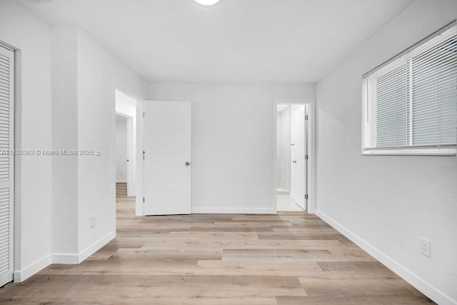 5201 Wiley St, Hollywood, FL 33021 - empty room featuring baseboards and wood finished floors