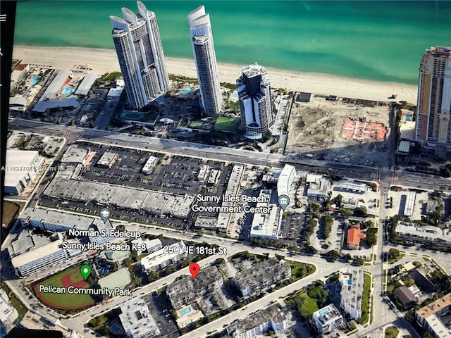 250 181st Dr Unit 212, Sunny Isles Beach, FL 33160 - aerial overview of property's location with expansive beach and nearby urban area