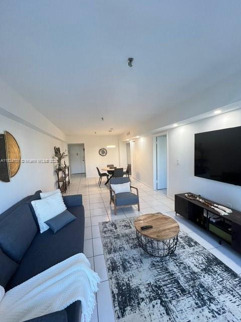 250 181st Dr Unit 212, Sunny Isles Beach, FL 33160 - living room featuring light tile patterned floors
