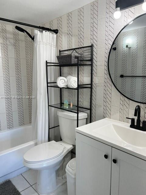 250 181st Dr Unit 212, Sunny Isles Beach, FL 33160 - full bath featuring shower / tub combo with curtain, vanity, tile patterned flooring, and tile walls