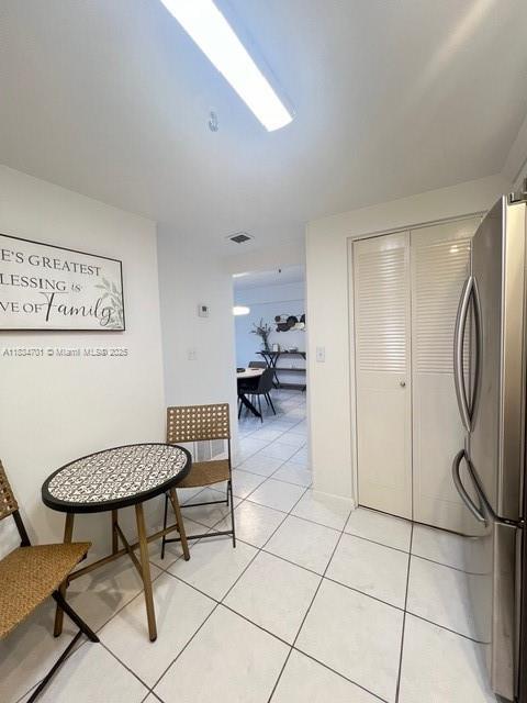 250 181st Dr Unit 212, Sunny Isles Beach, FL 33160 - corridor featuring light tile patterned flooring