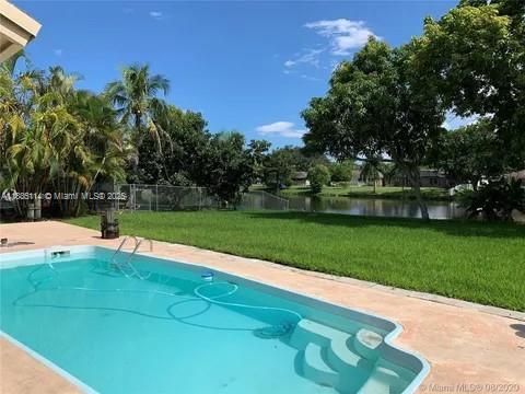 12600 SW 10th Ct, Davie, FL 33325 - view of pool featuring a water view