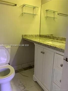 12600 SW 10th Ct, Davie, FL 33325 - bathroom with vanity and marble finish floors