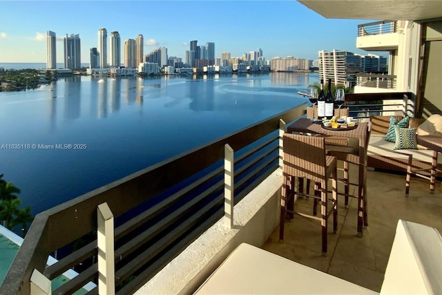 3530 Mystic Pointe Dr Unit 1714, Aventura, FL 33180 - balcony featuring a skyline view and a water view