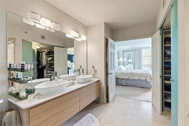 3530 Mystic Pointe Dr Unit 1714, Aventura, FL 33180 - full bath featuring ensuite bath, a walk in closet, and double vanity