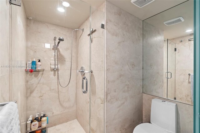 3530 Mystic Pointe Dr Unit 1714, Aventura, FL 33180 - bathroom with a marble finish shower and tile walls