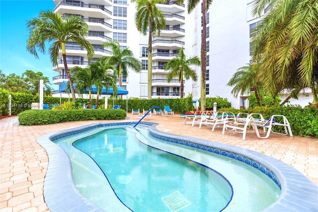 3530 Mystic Pointe Dr Unit 1714, Aventura, FL 33180 - community pool featuring a patio area